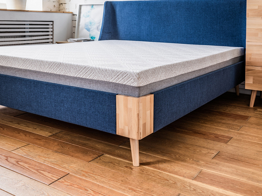 Кровать Lagom Side Soft 120x200 Ткань/Массив (бук) Лама Индиго/Масло-воск Natura (Бук) - Оригинальная кровать в обивке из мебельной ткани.