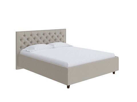 Кровать Teona - Кровать с высоким изголовьем, украшенным благородной каретной пиковкой.